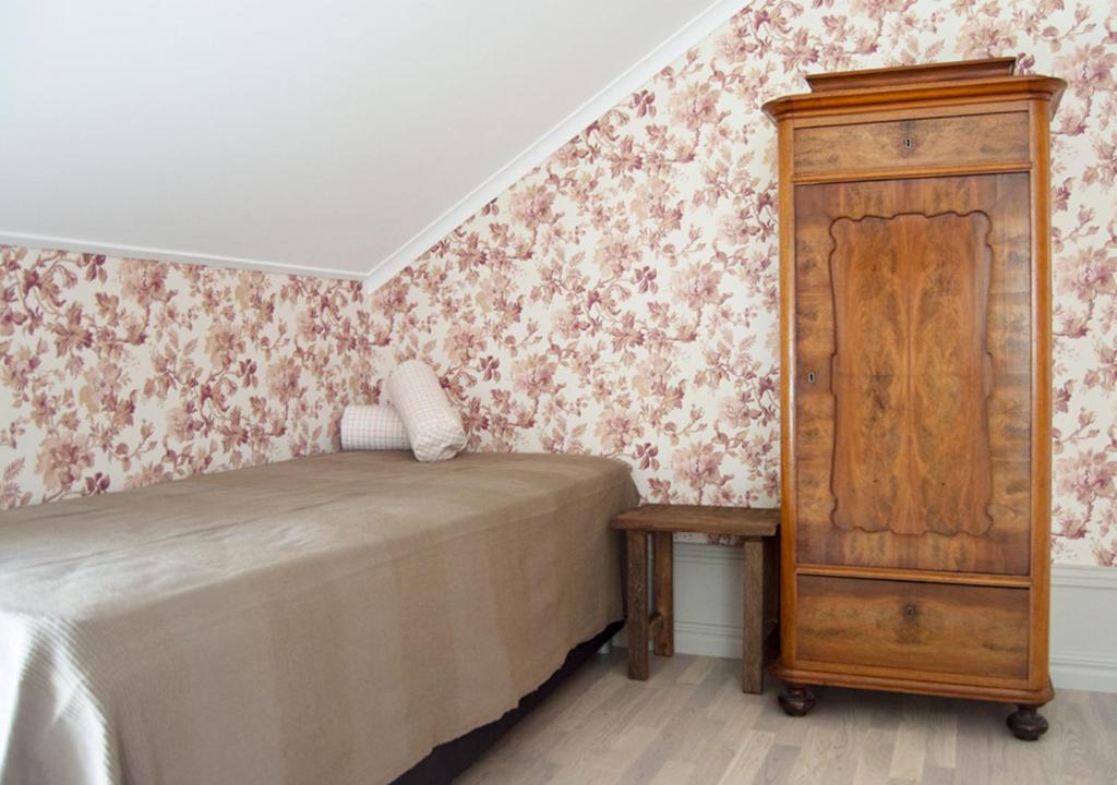Postel nebo postele na pokoji v ubytování Villa Fryksta