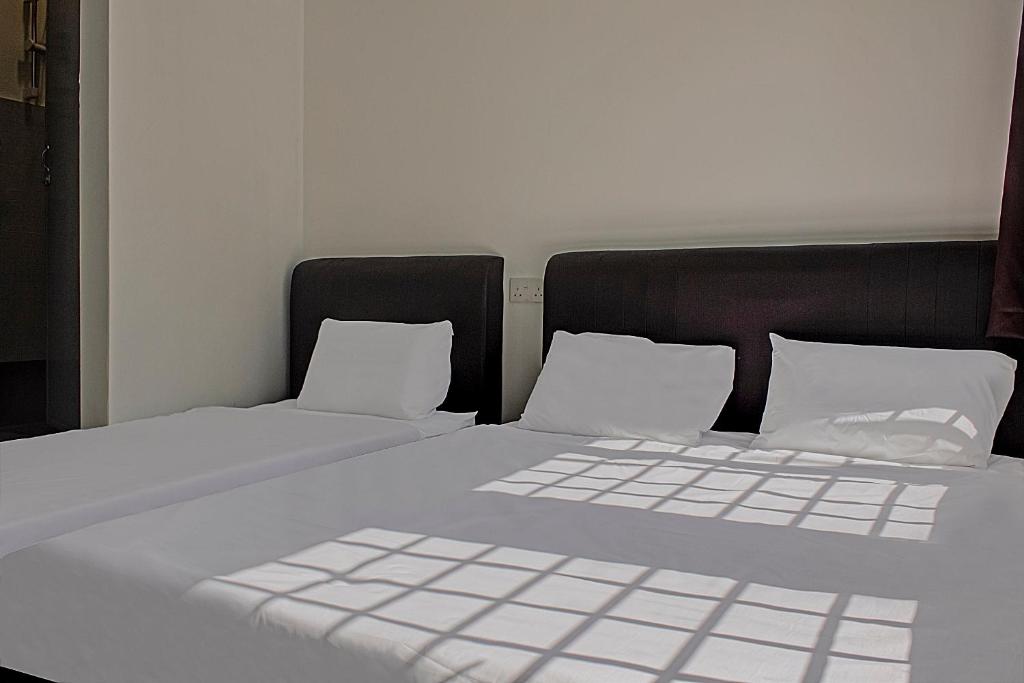 Postel nebo postele na pokoji v ubytování I Hotel