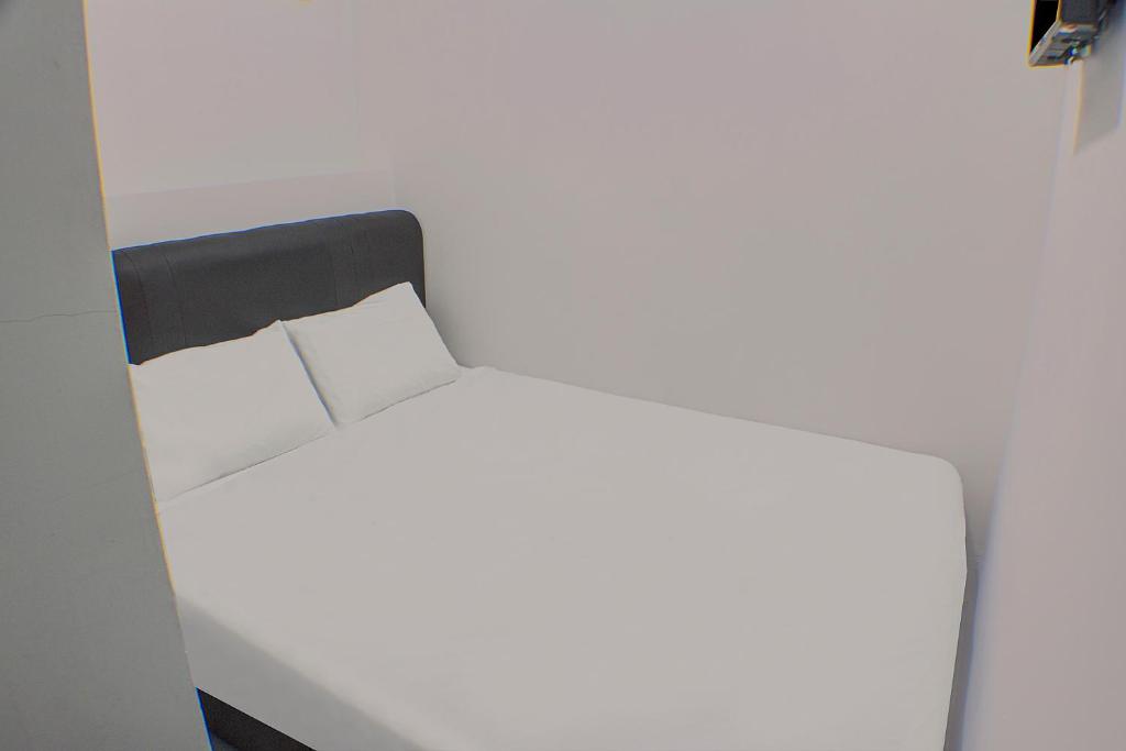 Postel nebo postele na pokoji v ubytování I Hotel