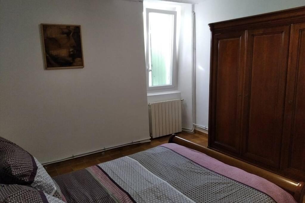 Postel nebo postele na pokoji v ubytování Gîte en Cévennes