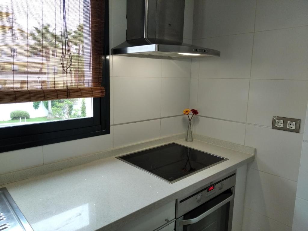A kitchen or kitchenette at Camalavi