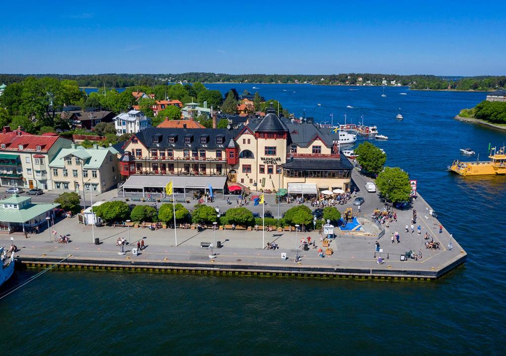 an aerial view of a town next to the water at Waxholms Hotell in Vaxholm