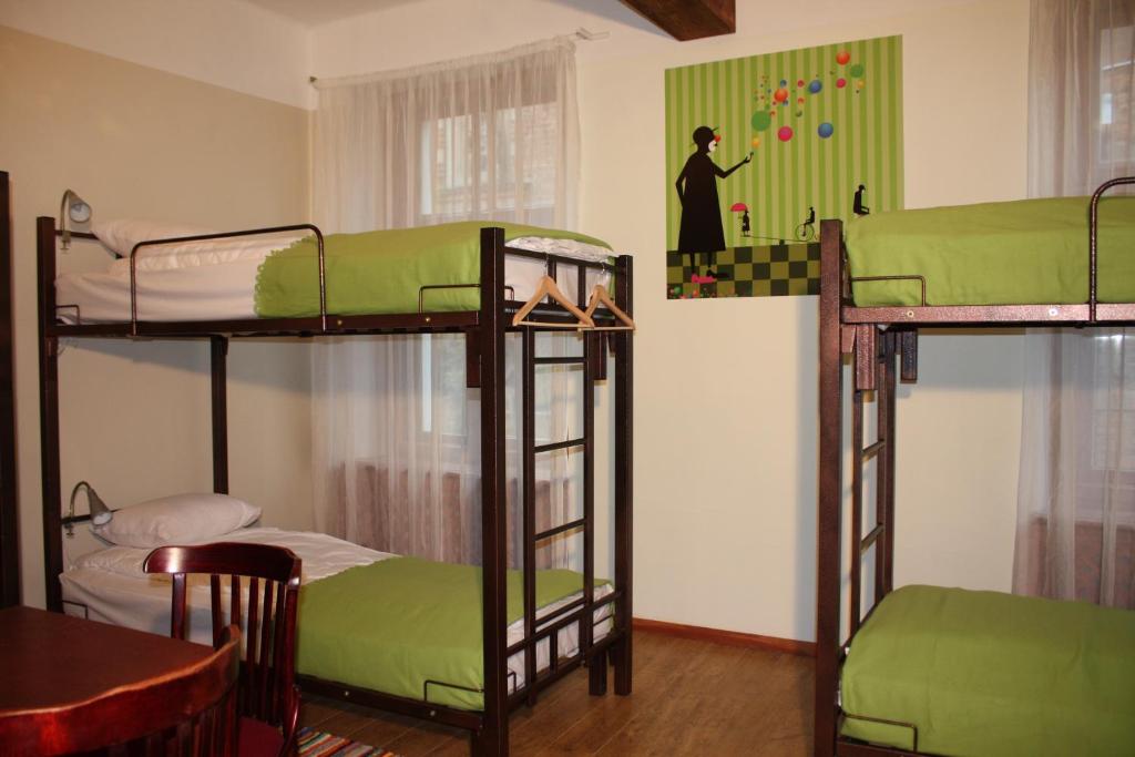 Postel nebo postele na pokoji v ubytování Red Nose Hostel with Self-Check In
