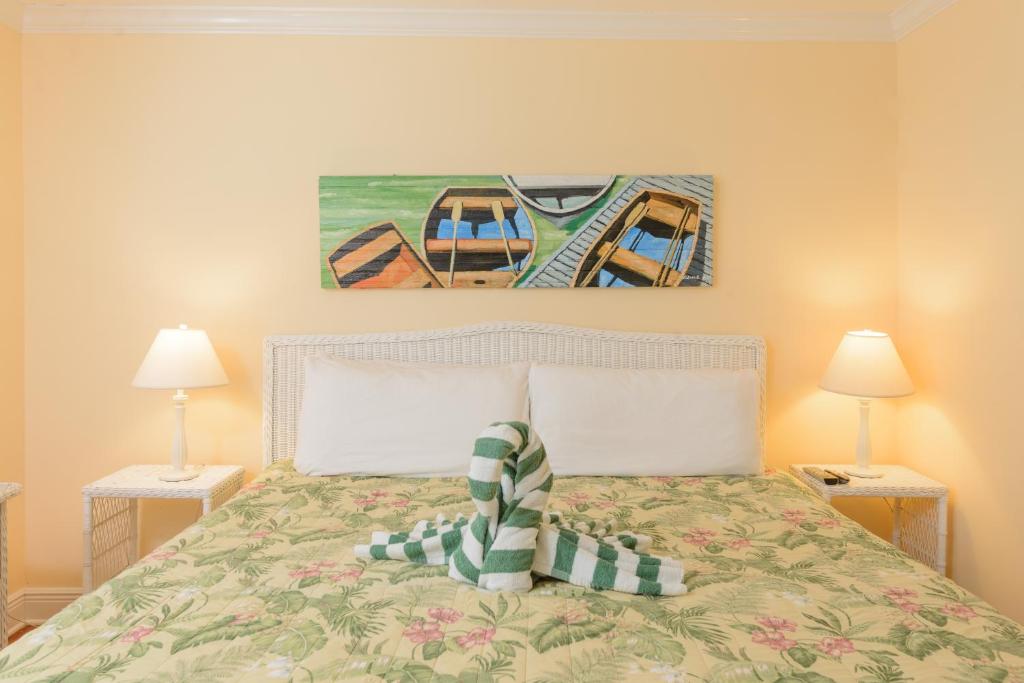 Postel nebo postele na pokoji v ubytování Key West Villas