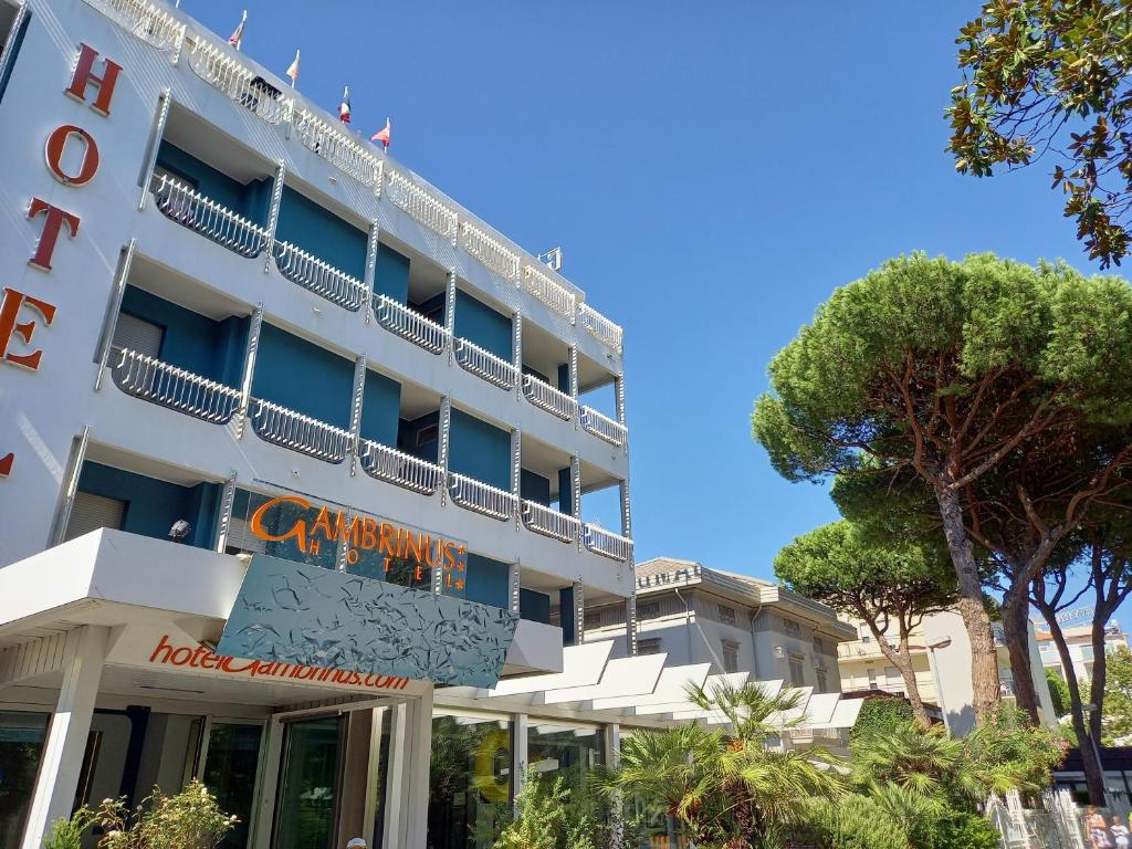 a hotel with a sign on the front of it at Hotel Gambrinus in Riccione