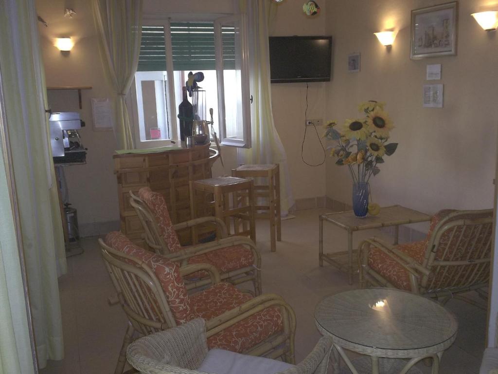 TV a/nebo společenská místnost v ubytování Hotel Magda