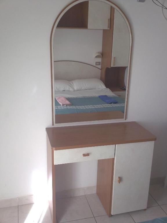 Postel nebo postele na pokoji v ubytování Hotel Magda