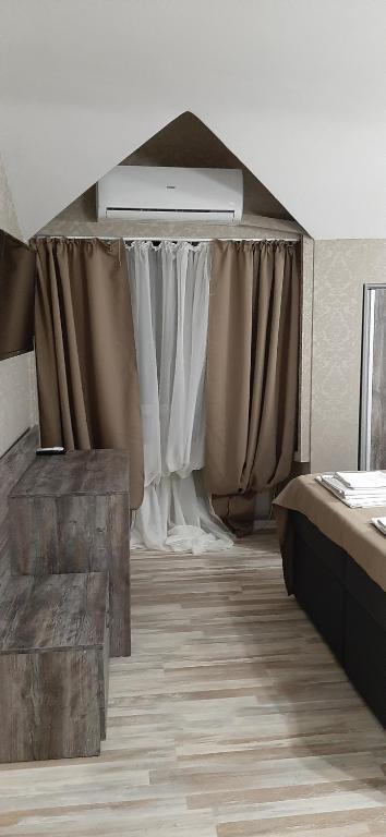 Postel nebo postele na pokoji v ubytování Vida Family Hotel