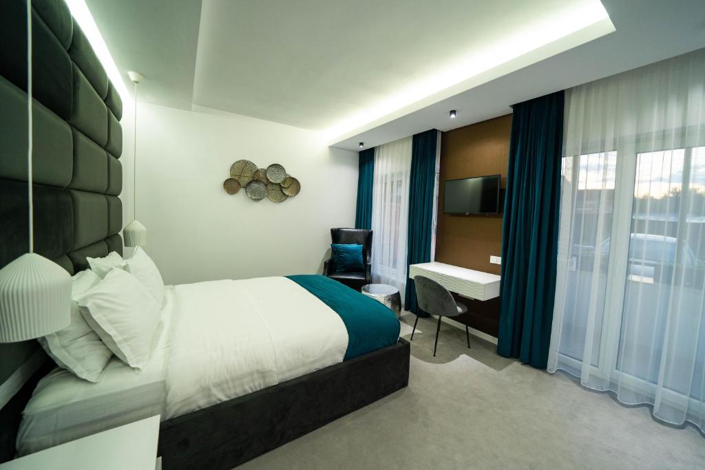 Postel nebo postele na pokoji v ubytování Velvet Home