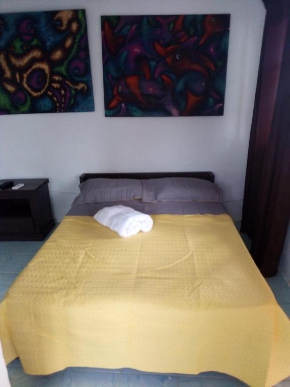 Cama o camas de una habitación en Hotel Cocotal