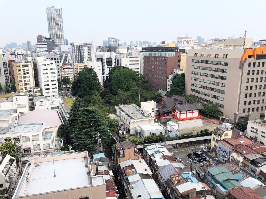an aerial view of a city with buildings at Citadines Central Shinjuku Tokyo in Tokyo