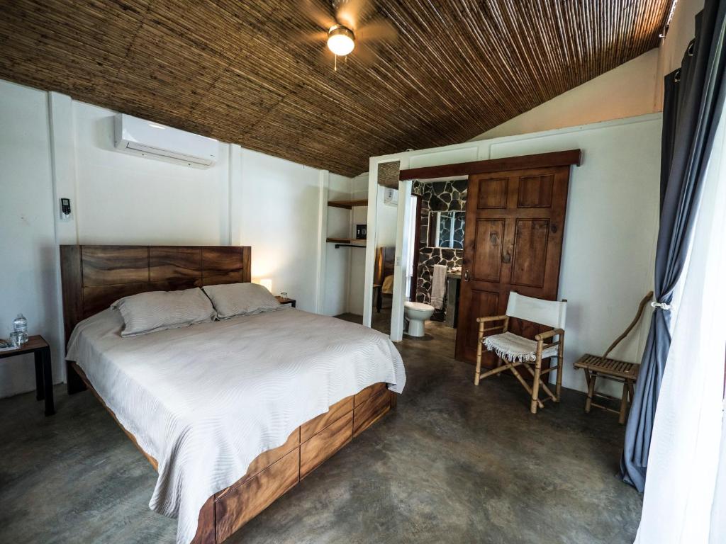 Postel nebo postele na pokoji v ubytování Hotel Peace & Lodge