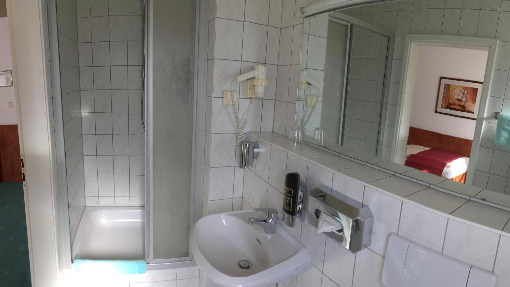Koupelna v ubytování Hotel Hansa