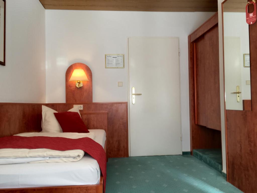 Postel nebo postele na pokoji v ubytování Hotel Hansa