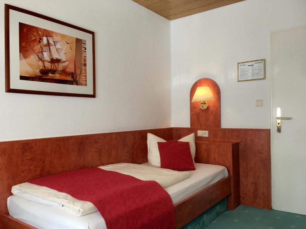 Postel nebo postele na pokoji v ubytování Hotel Hansa
