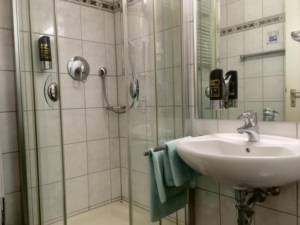 Koupelna v ubytování Hotel Hansa