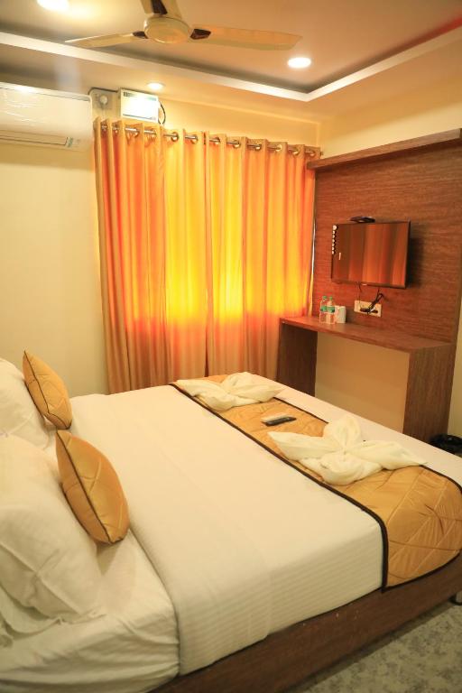 Postel nebo postele na pokoji v ubytování Hotel Kheni