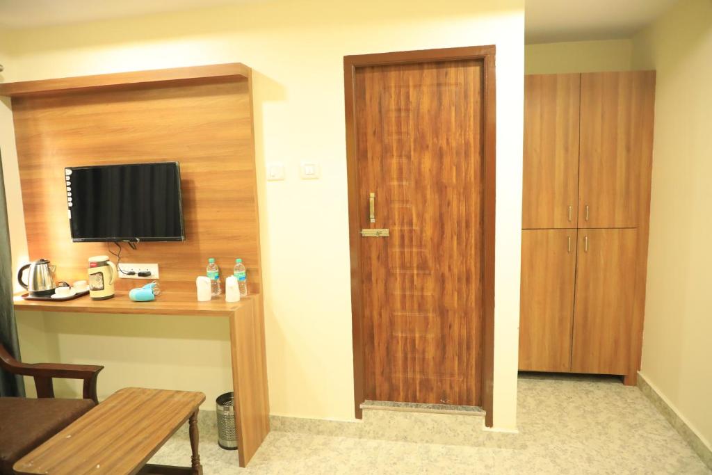TV a/nebo společenská místnost v ubytování Hotel Kheni