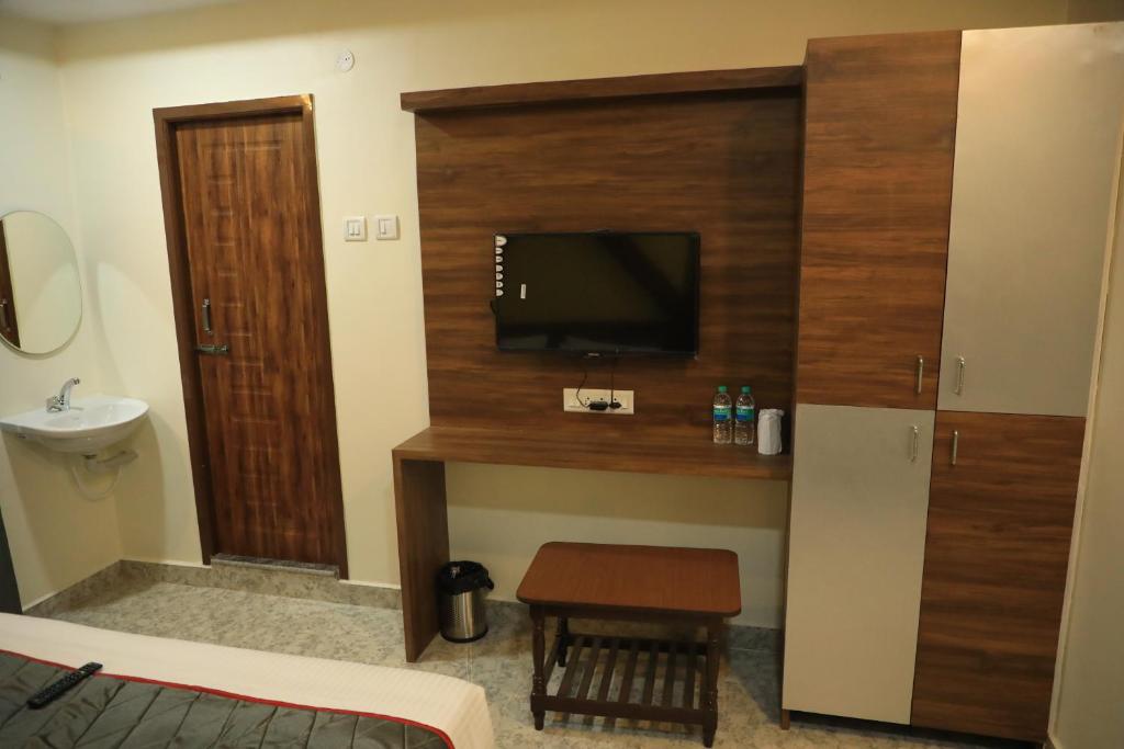 TV a/nebo společenská místnost v ubytování Hotel Kheni