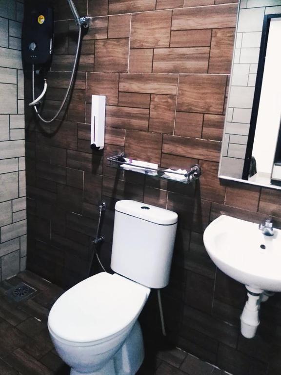 Koupelna v ubytování D'Metro Hotel
