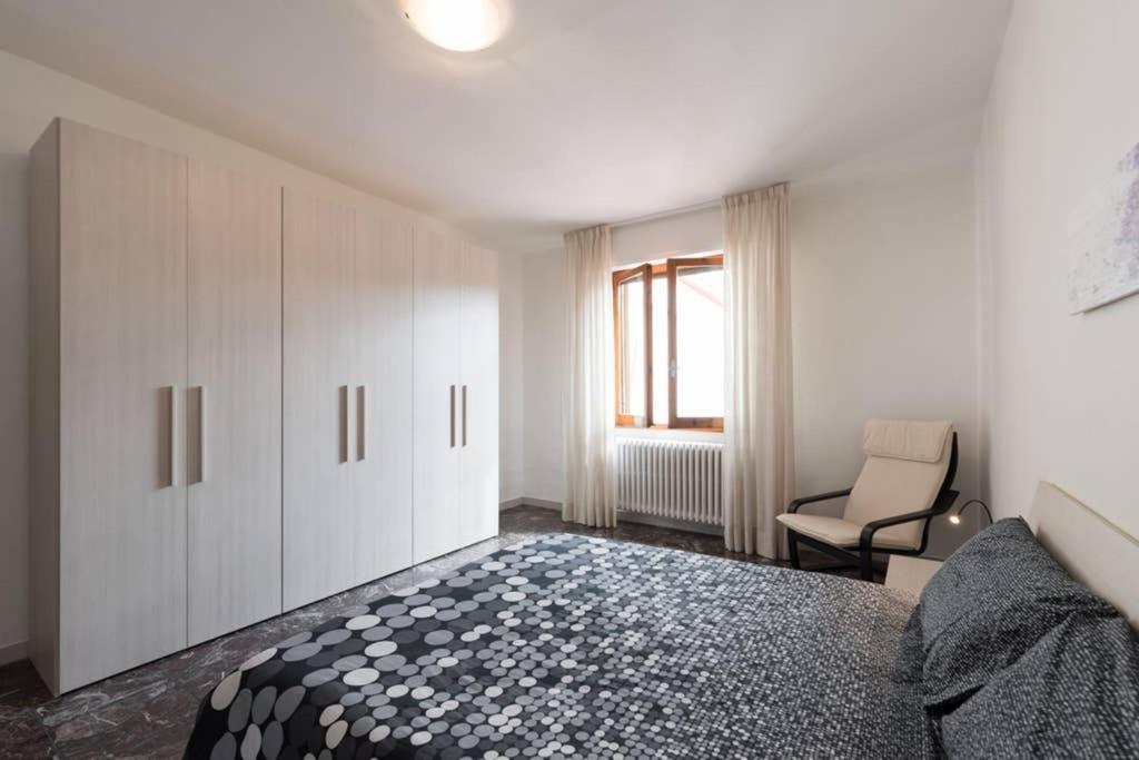 Łóżko lub łóżka w pokoju w obiekcie La Casa di Lucia - Firenze