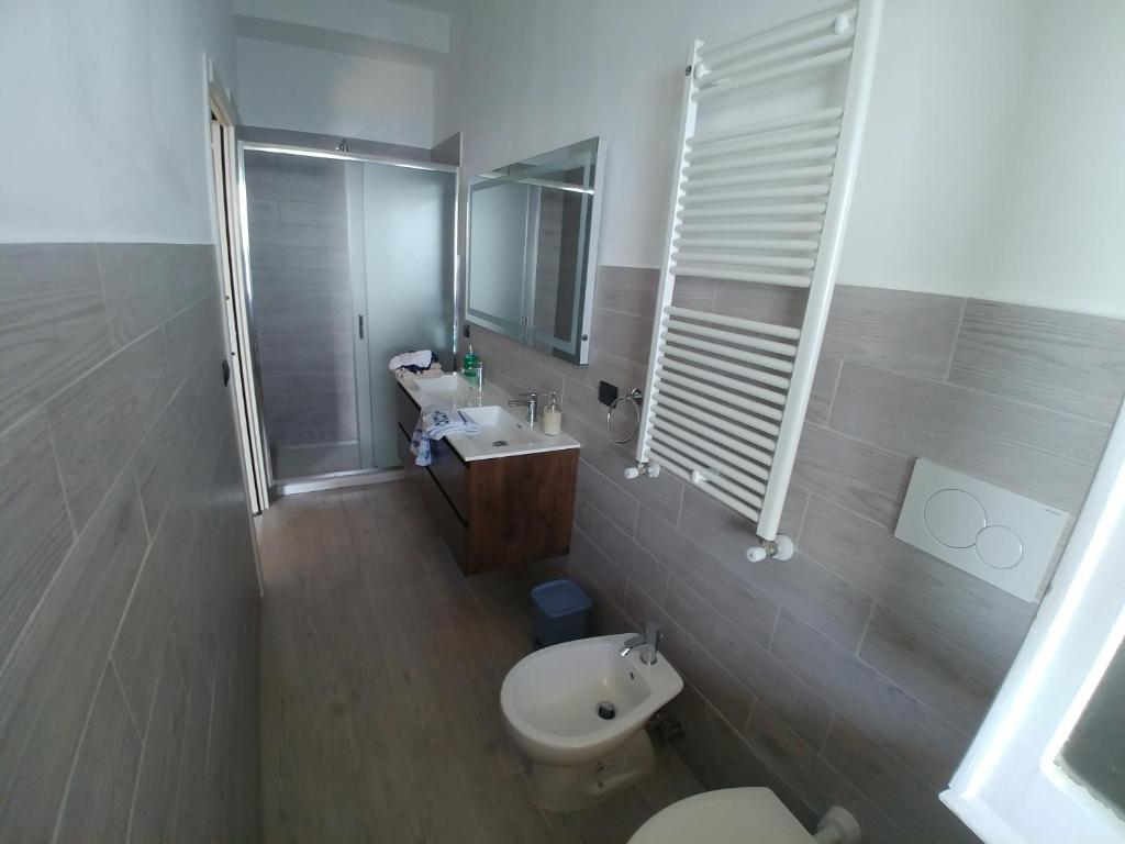 a bathroom with a toilet and a sink and a shower at GIARDINO SUL MARE in Amalfi