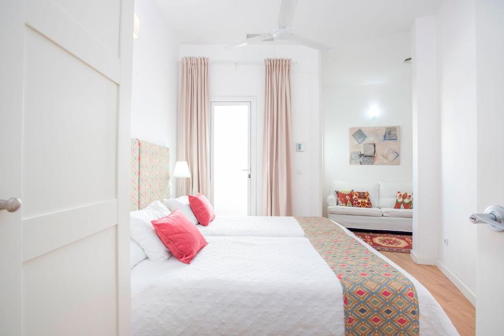 Posteľ alebo postele v izbe v ubytovaní Genteel Home Zaragoza