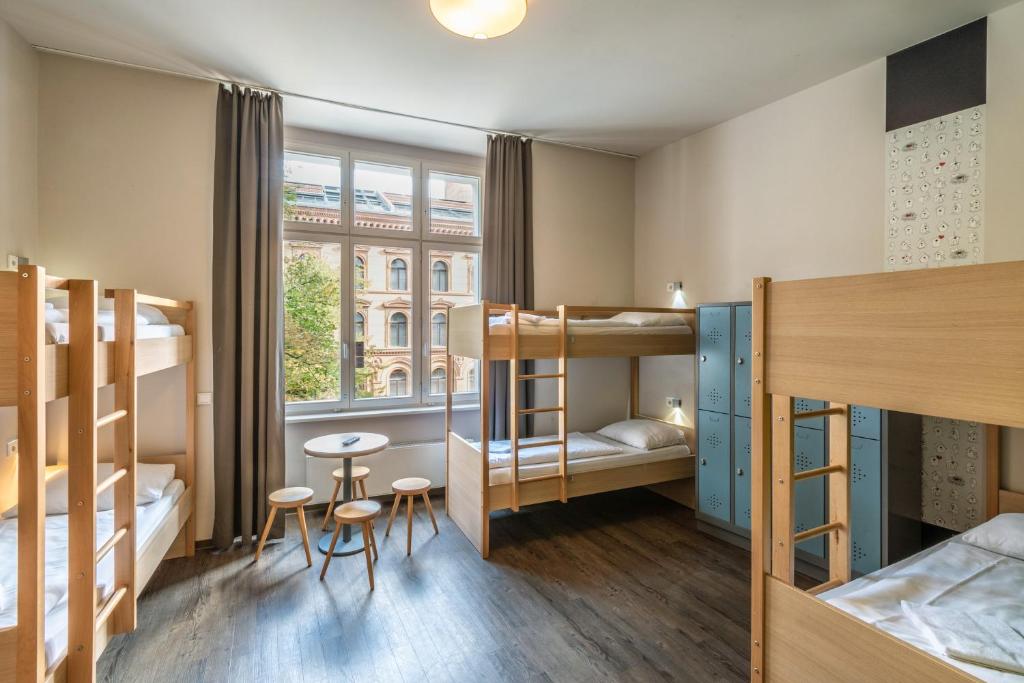 Postel nebo postele na pokoji v ubytování MEININGER Hotel Berlin Mitte
