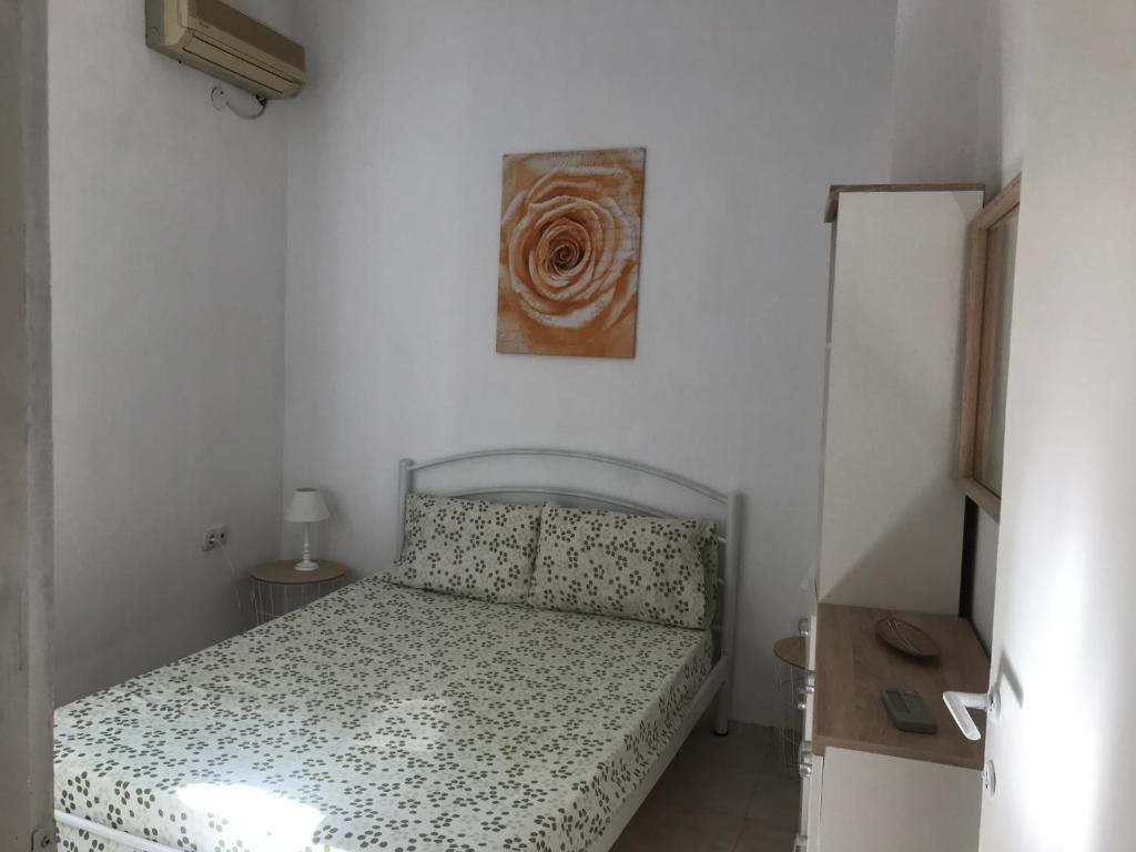 Postel nebo postele na pokoji v ubytování Istos Apartment