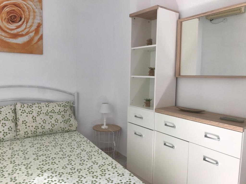 Postel nebo postele na pokoji v ubytování Istos Apartment