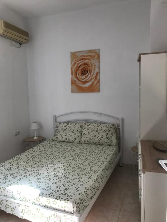 Postel nebo postele na pokoji v ubytování Istos Apartment