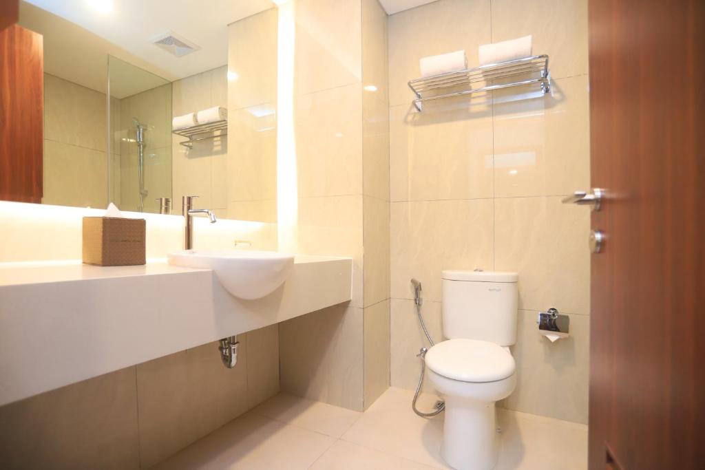 Koupelna v ubytování Luxury Inn Arion Hotel