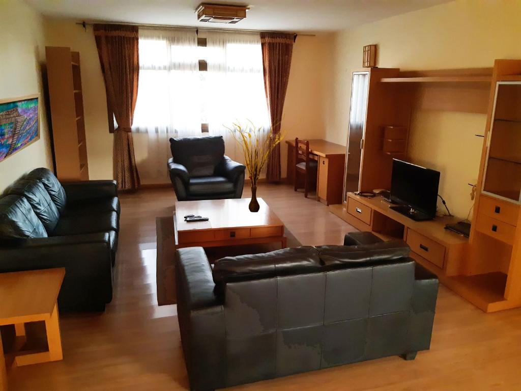 TV a/nebo společenská místnost v ubytování Kates Apartments