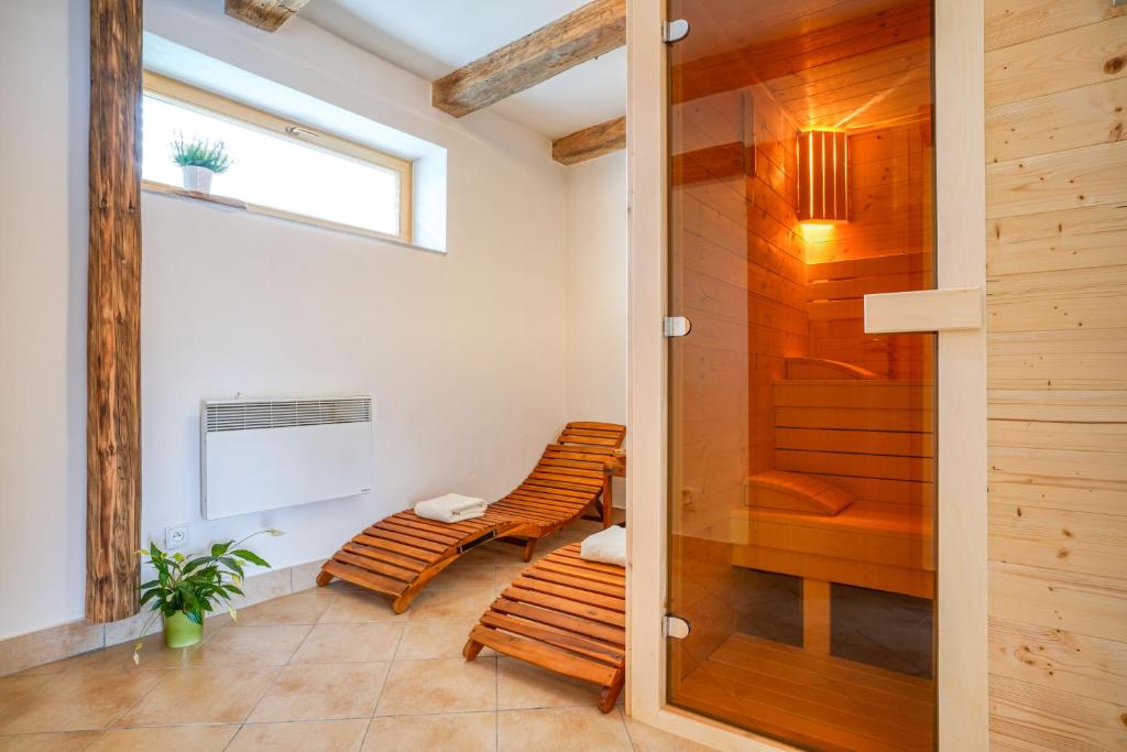 Fotografie z fotogalerie ubytování ČÁKYHO KÚRIA - mezonetový apartmán s krbom a saunami ve Smižanech