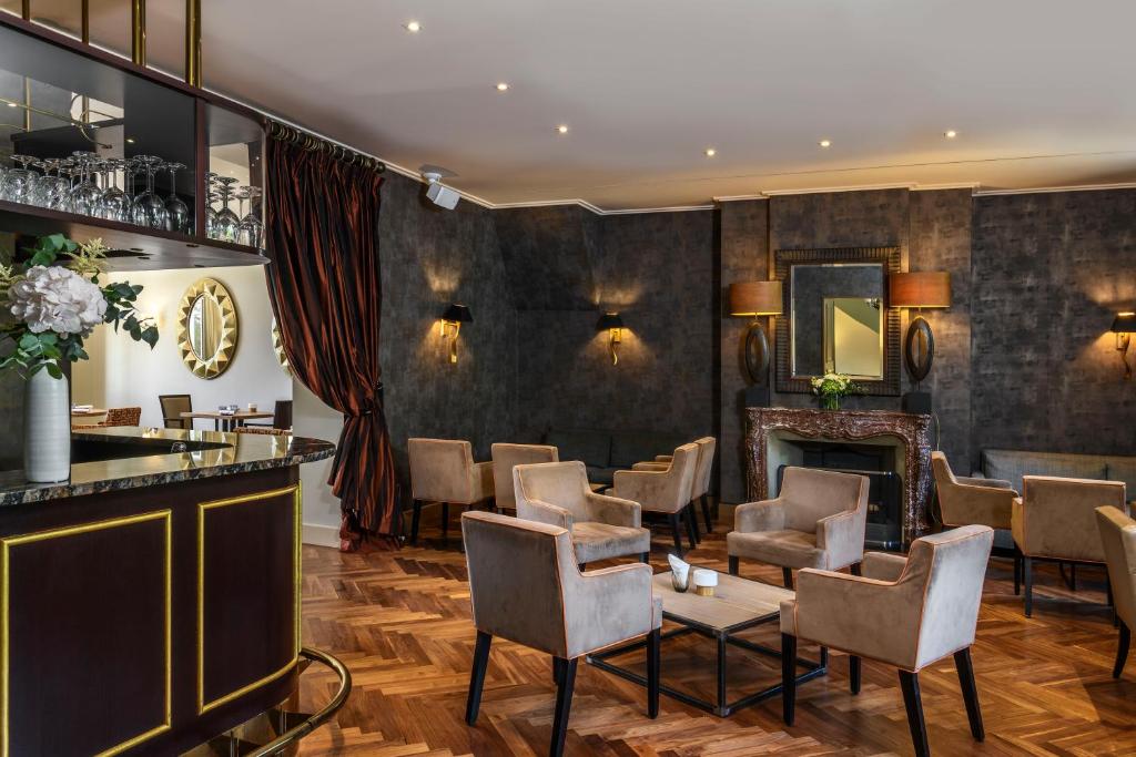 Posezení v ubytování Hôtel Résidence Parc des Eaux Vives