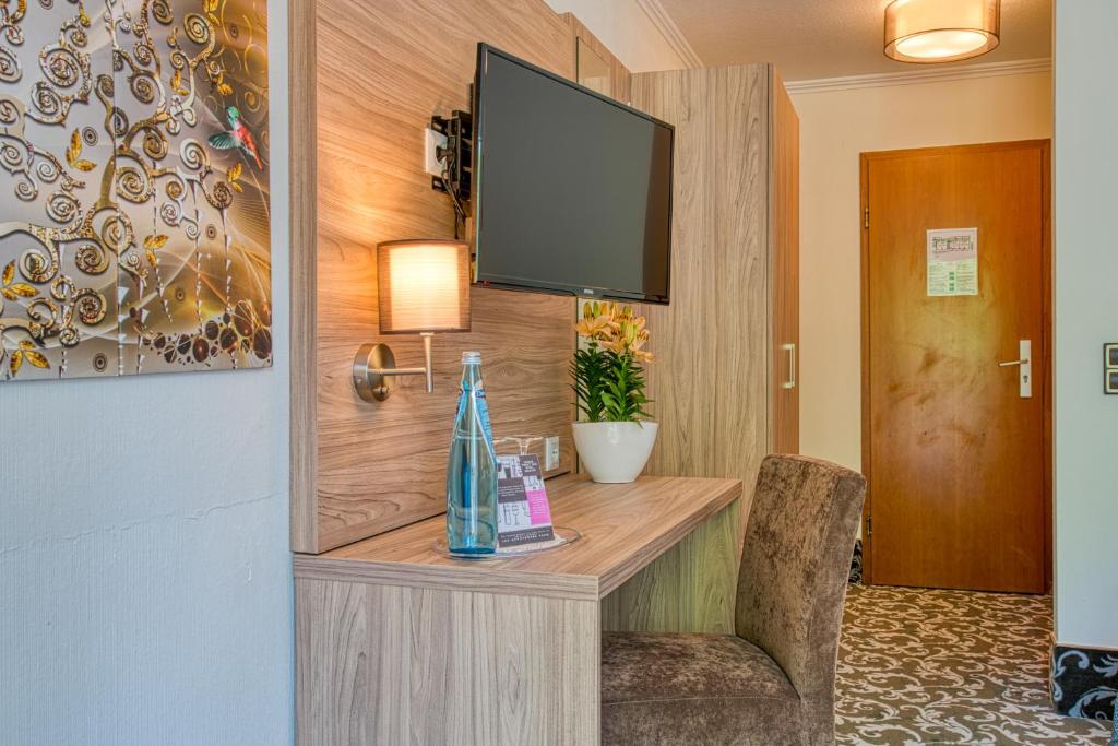 TV a/nebo společenská místnost v ubytování Sporthotel Bad Bevensen