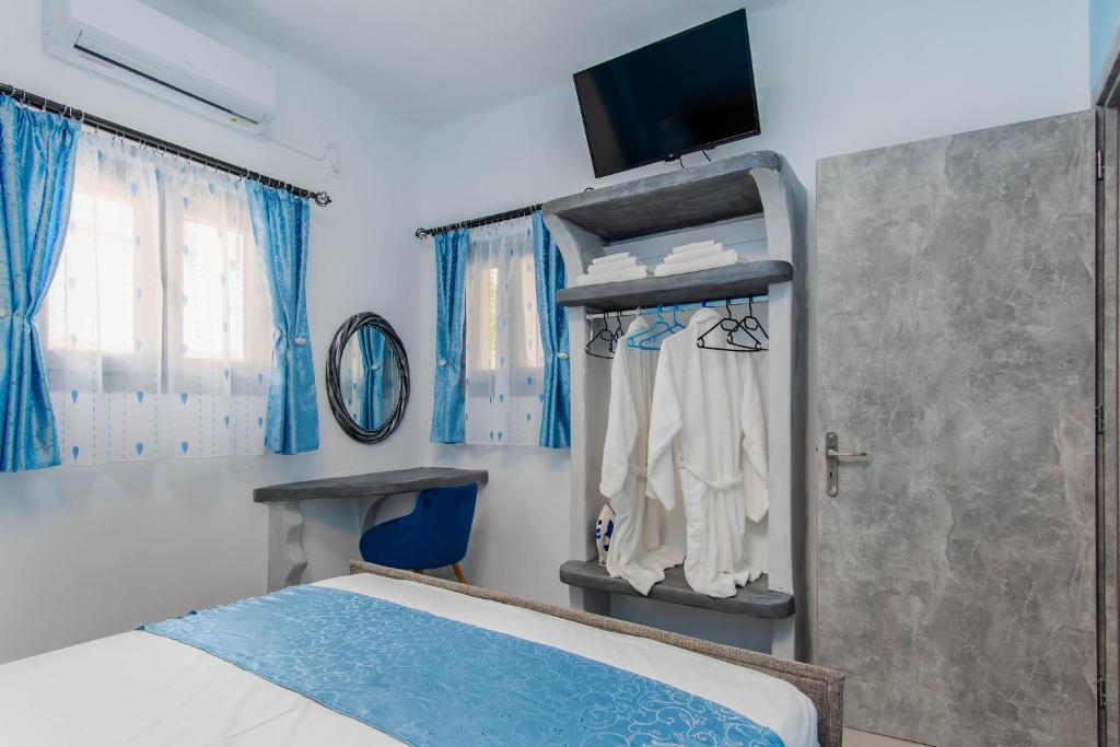 Postel nebo postele na pokoji v ubytování N RENIERIS Apartments