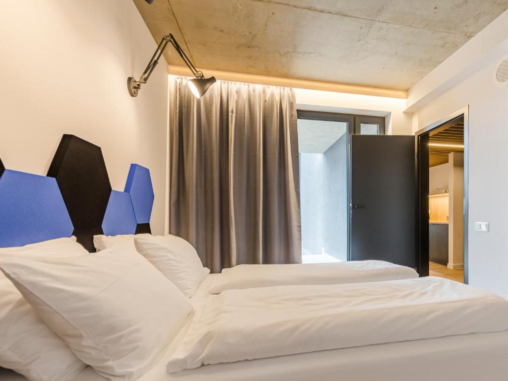 Postel nebo postele na pokoji v ubytování Villa Verdi Pleasure & Spa