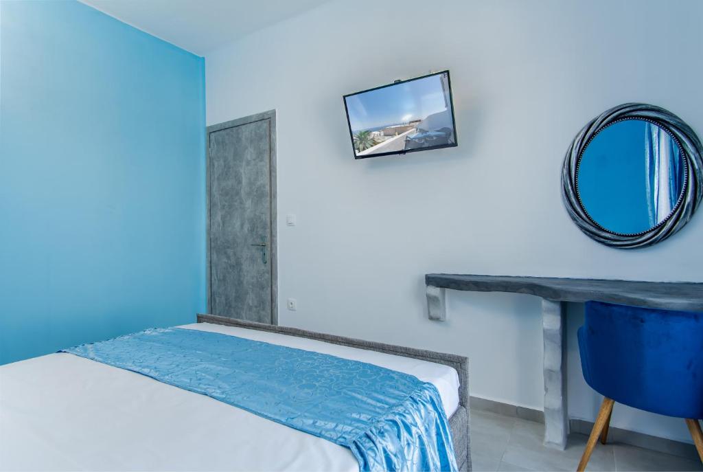 Postel nebo postele na pokoji v ubytování N RENIERIS Apartments