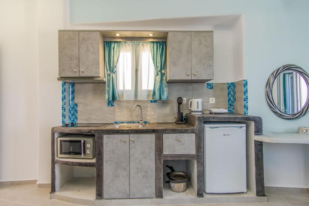 Kuchyň nebo kuchyňský kout v ubytování N RENIERIS Apartments