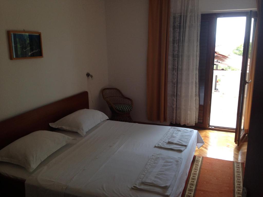 Postel nebo postele na pokoji v ubytování B&B Pansion Jure Matijević