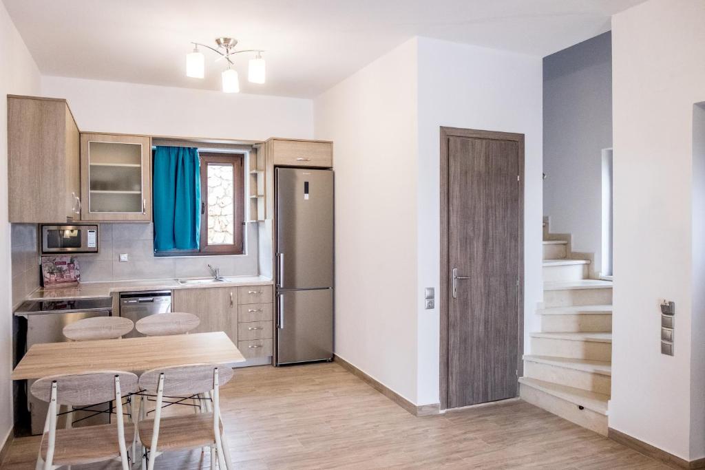 Kuchyň nebo kuchyňský kout v ubytování Amousso Beach Villas