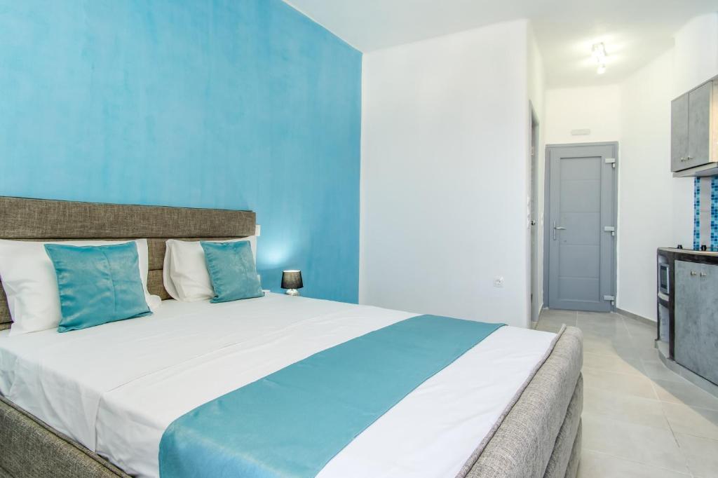 Postel nebo postele na pokoji v ubytování N RENIERIS Apartments