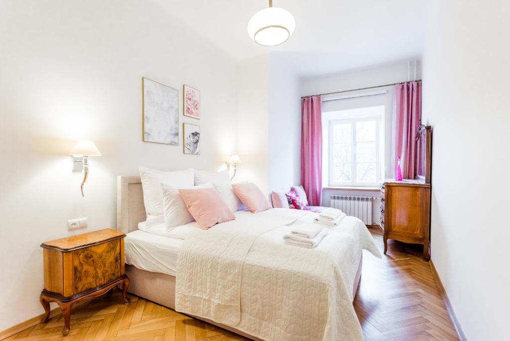 Posteľ alebo postele v izbe v ubytovaní Ego Apartments Old Town II
