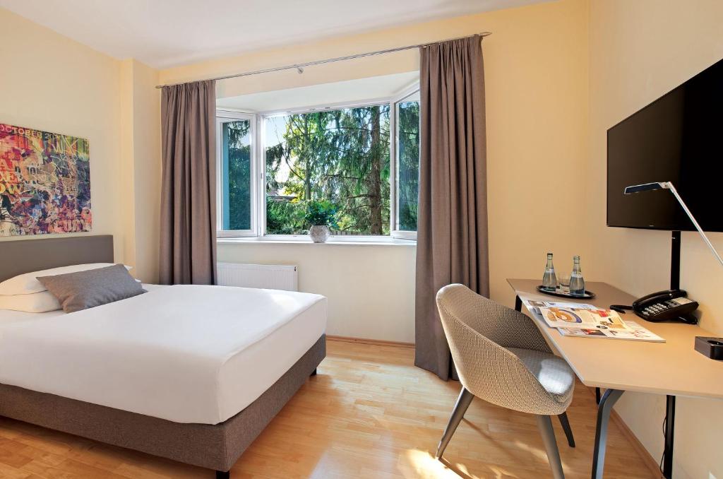 TV a/nebo společenská místnost v ubytování Hotel Villa Medici