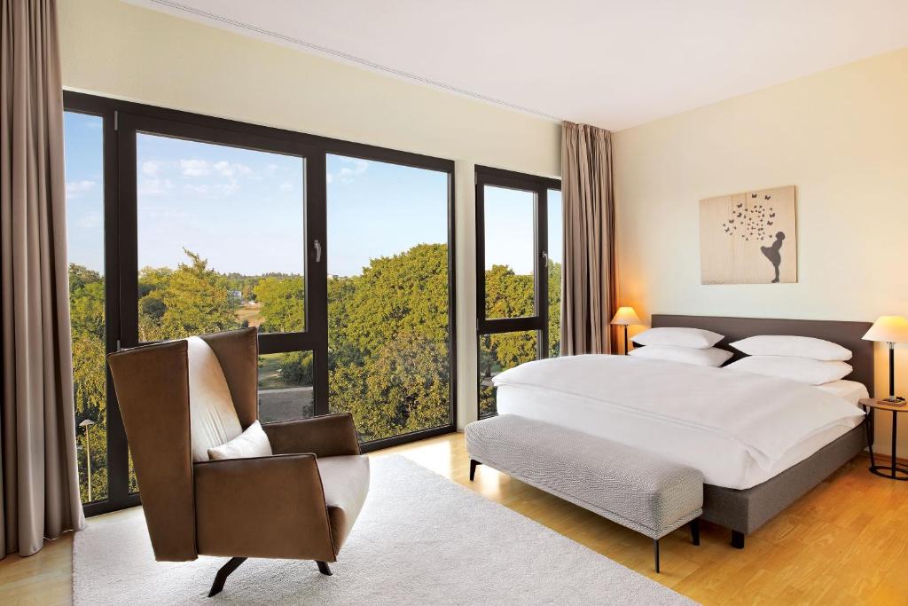 Postel nebo postele na pokoji v ubytování Hotel Villa Medici