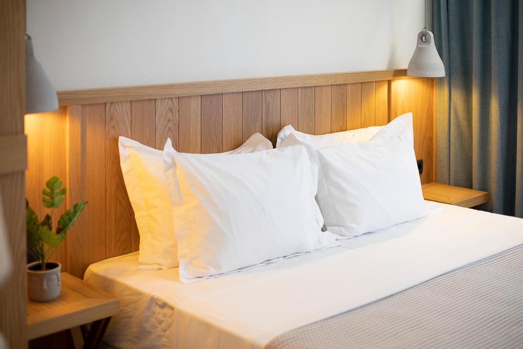 Postel nebo postele na pokoji v ubytování White Nest Villas