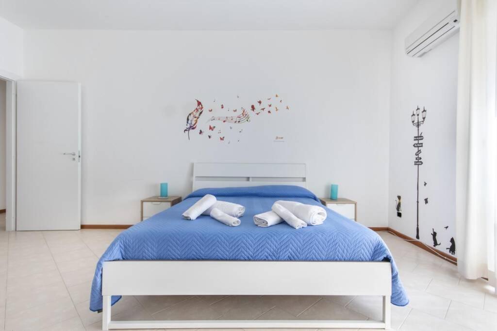 A bed or beds in a room at Al Politeama
