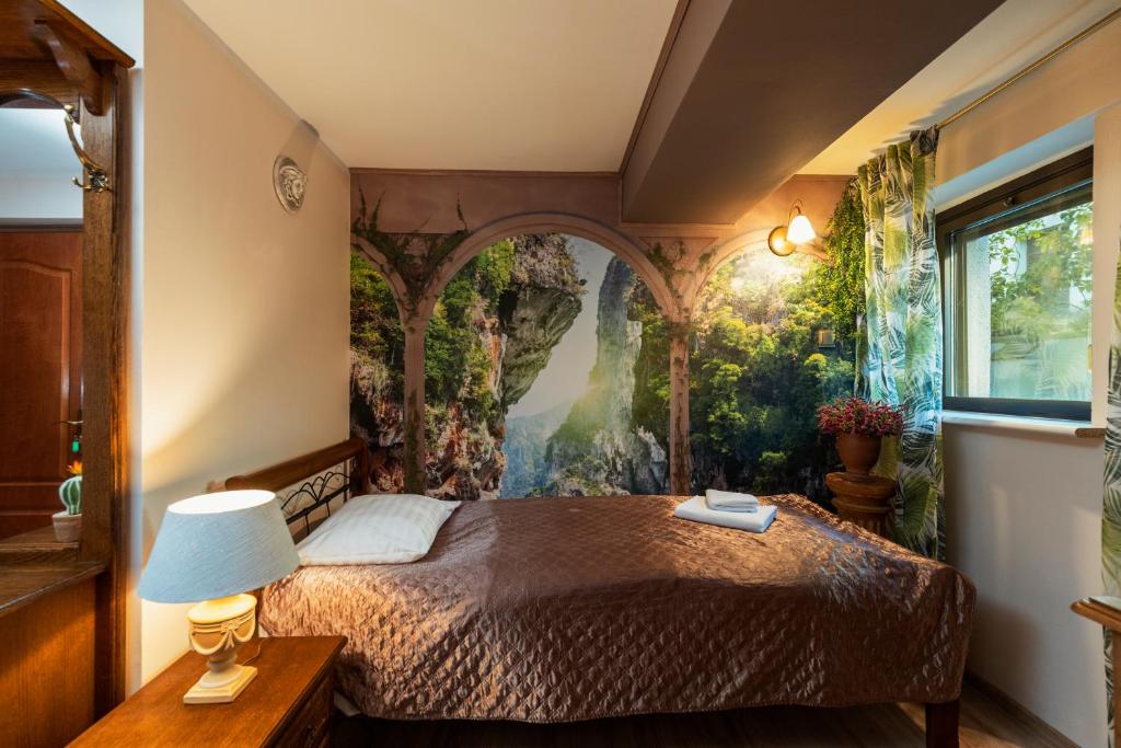Posteľ alebo postele v izbe v ubytovaní Villa Toscania-check in 24h