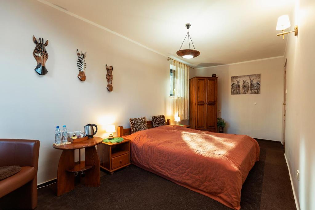 Posteľ alebo postele v izbe v ubytovaní Villa Toscania-check in 24h